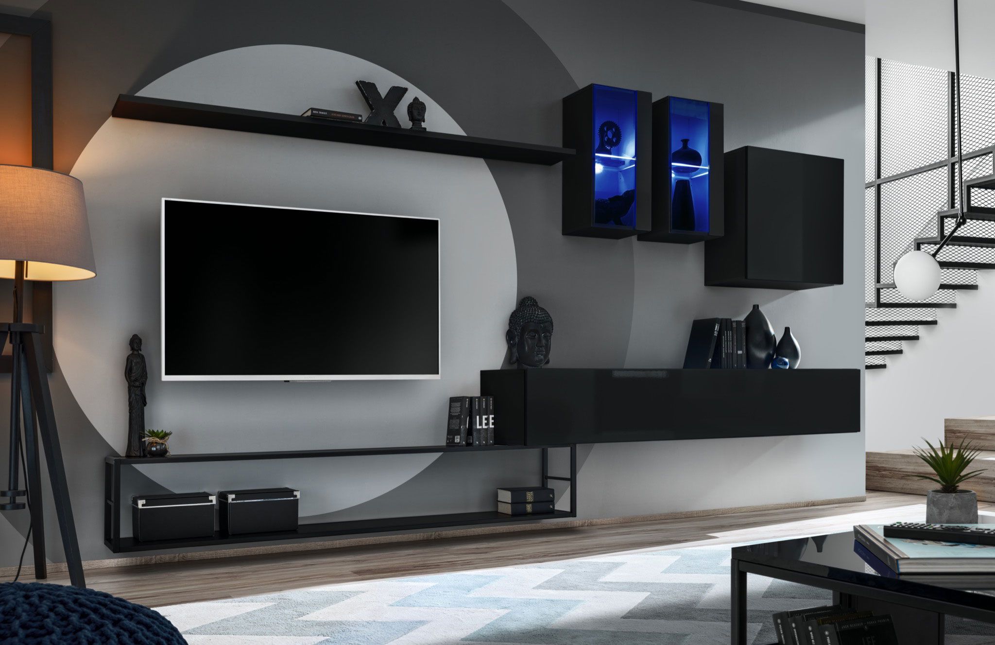 Stylische Wohnzimmerwand Valand 02, Farbe: Schwarz - Abmessungen: 180 x 330 x 40 cm (H x B x T), mit blauer LED-Beleuchtung