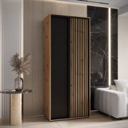 Kleiderschrank Tharo mit Schiebetüren in Eiche/Schwarz gehalten, 235,2 x 110 x 45 cm, platzsparend, auch für Wohnzimmer geeignet, Einlegeböden