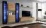 Wohnwand im stylischen Design Balestrand 254, Farbe: Schwarz / Eiche Wotan - Abmessungen: 180 x 330 x 40 cm (H x B x T), mit LED-Beleuchtung
