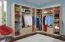 Kleiderschrank | 4 Drehtüren | 2 Schubladen | 7 Fächer | mit 2 Kleiderstangen | 200 cm breit | Farbe: Sonoma Eiche Abbildung