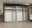Drehtürenschrank mit Soft-Close-Funktion Eiger 54, Farbe: Kaschmir, 3 Meter breit, vier Kleiderstangen, Kleiderschrank, Griffe: Kaschmir, vier Fächer