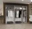 Drehtürenschrank mit zwei Spiegeltüren Eiger 89, Farbe: Eiche Artisan, 2,5 Meter breit, Griffe: Schwarz, drei Kleiderstangen, Kleiderschrank, drei Fächer